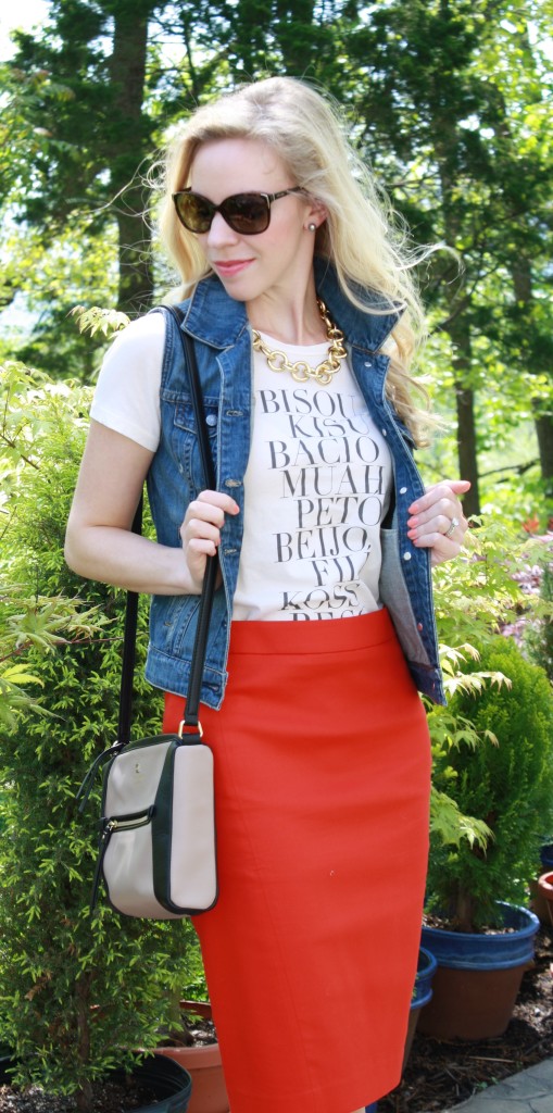 Graphic J. Crew tee, distressed denim vest, red pencil skirt, gold chunky chain necklace