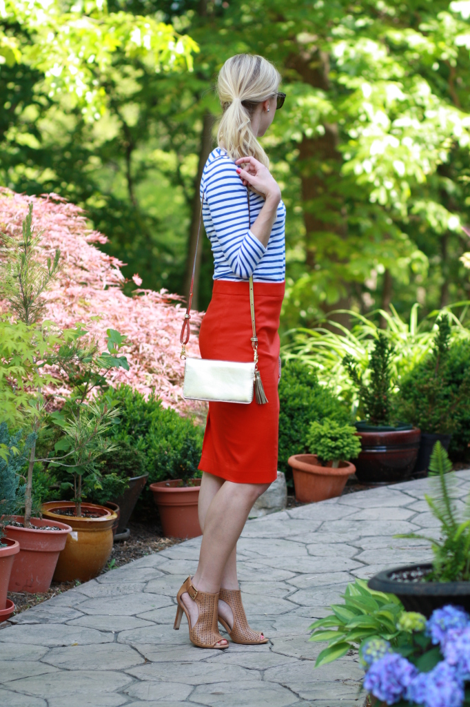 blue striped tee, bright red pencil skirt, gold Brahmin Amelia crossbody bag, tan leather peep-toe booties