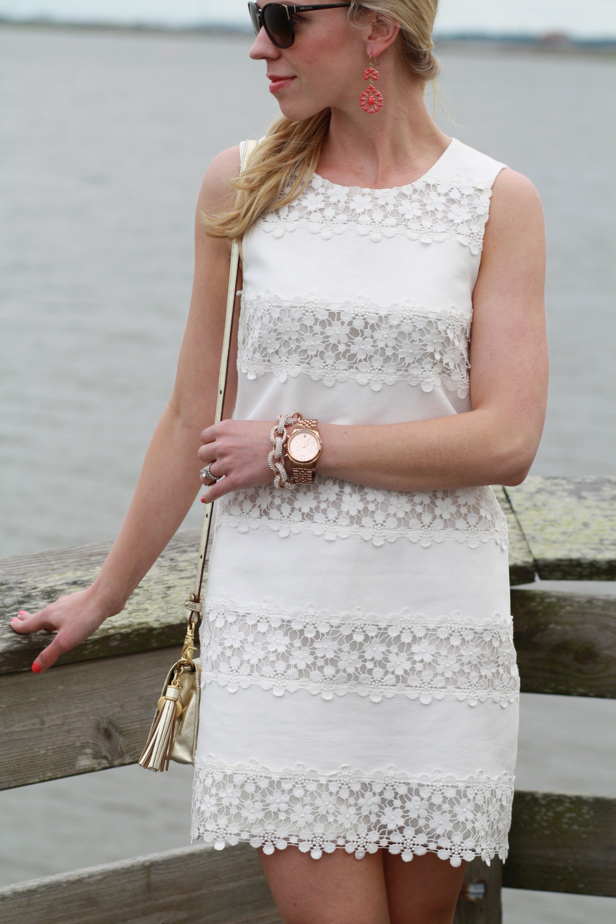 white dress with rose gold accessories