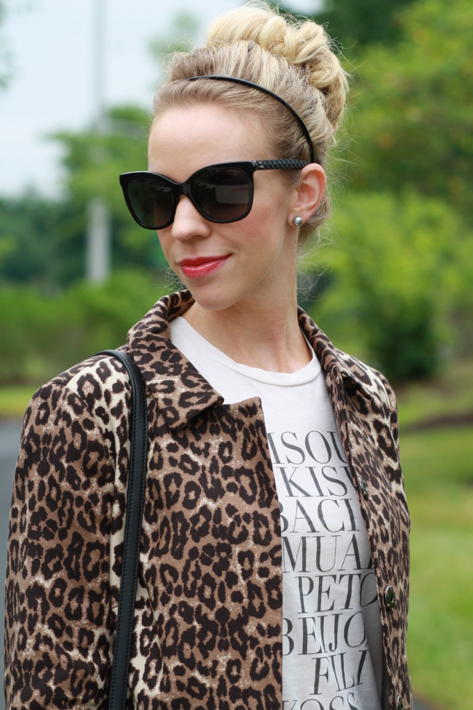 black Chanel cateye sunglasses, faux sock bun, graphic tee, leopard print coat