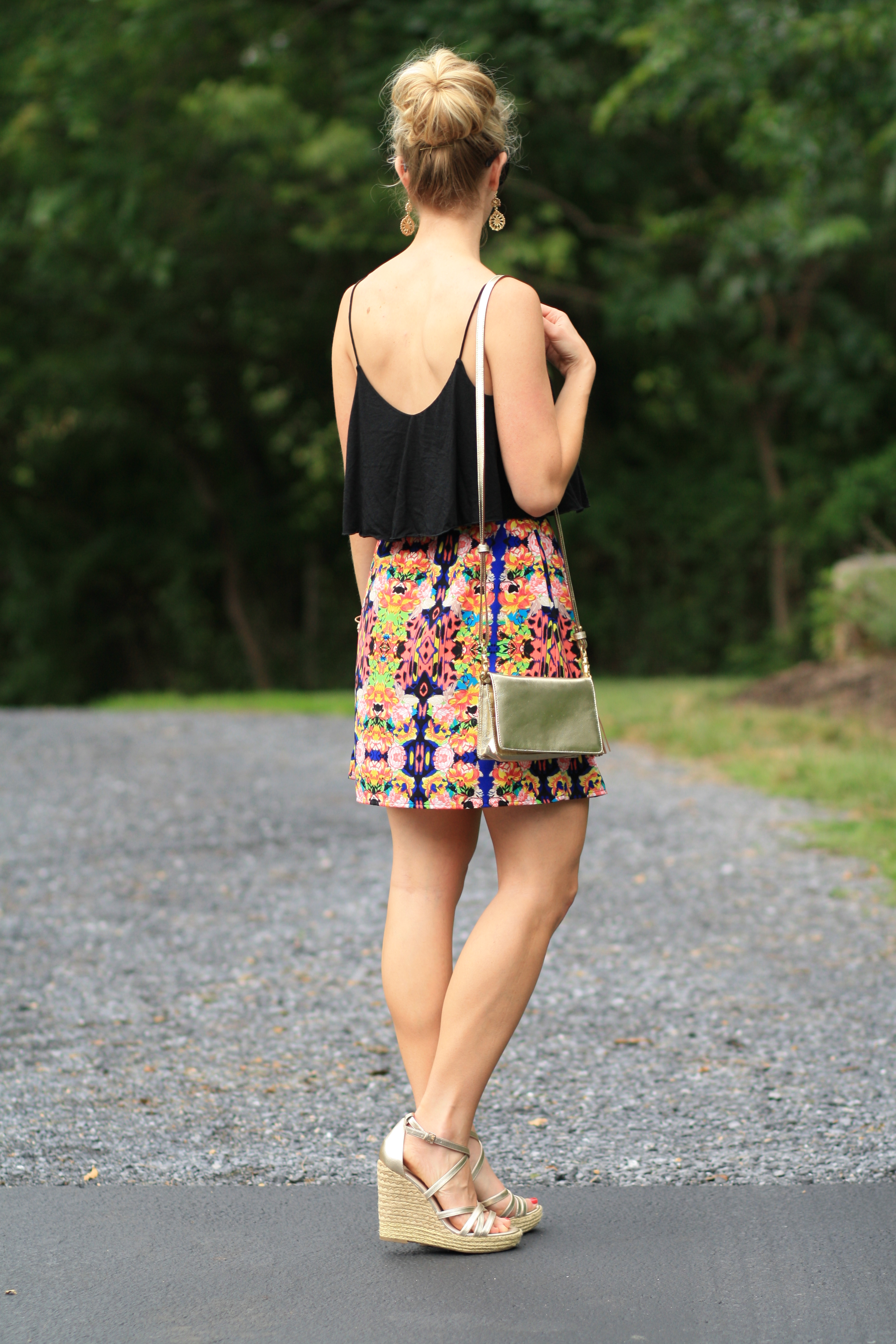 { Island-Inspired: Black cropped cami, Colorful skirt & Gold