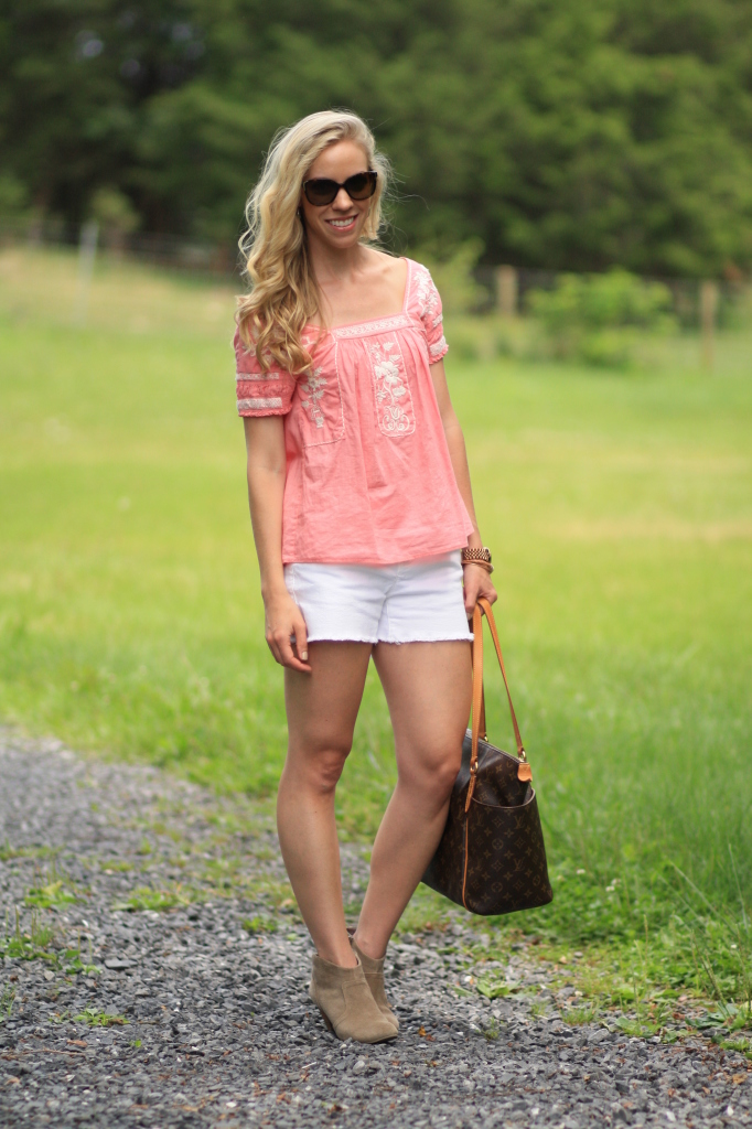 J. Crew coral pink floral embroidered peasant top, white denim cutoff shorts, Louis Vuitton tote, tan suede ankle boots, Prada sunglasses