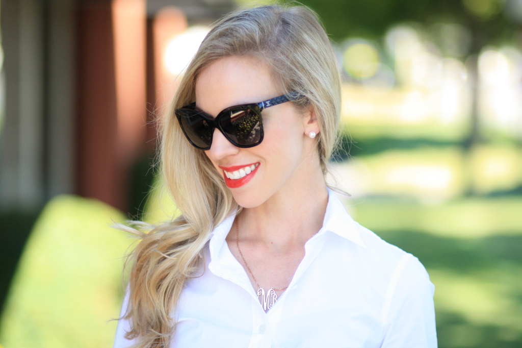 Bare Minerals moxie lipstick Live it Up, bright red lip, Chanel leather trim oversized black cateye sunglasses, white button down shirt, rose gold monogram necklace, classic look