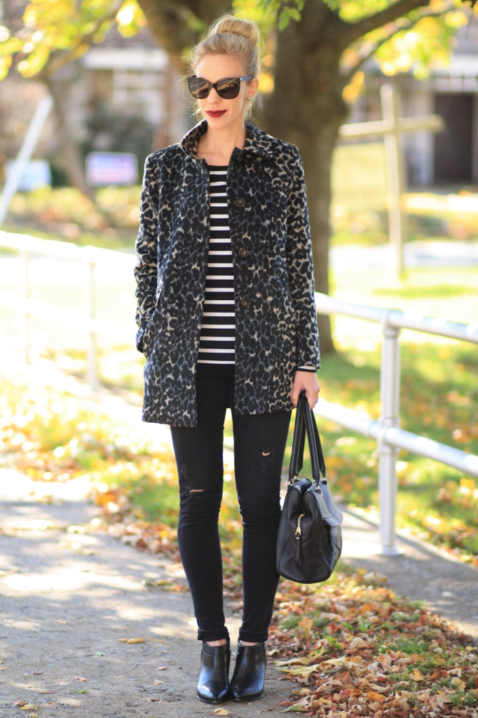 LOFT blue snow leopard print car coat, black and white striped tee, leopard and stripes, AG Adriano Goldschmied black distressed middi ankle jeans, black pointy toe ankle boots, Chanel cateye sunglasses