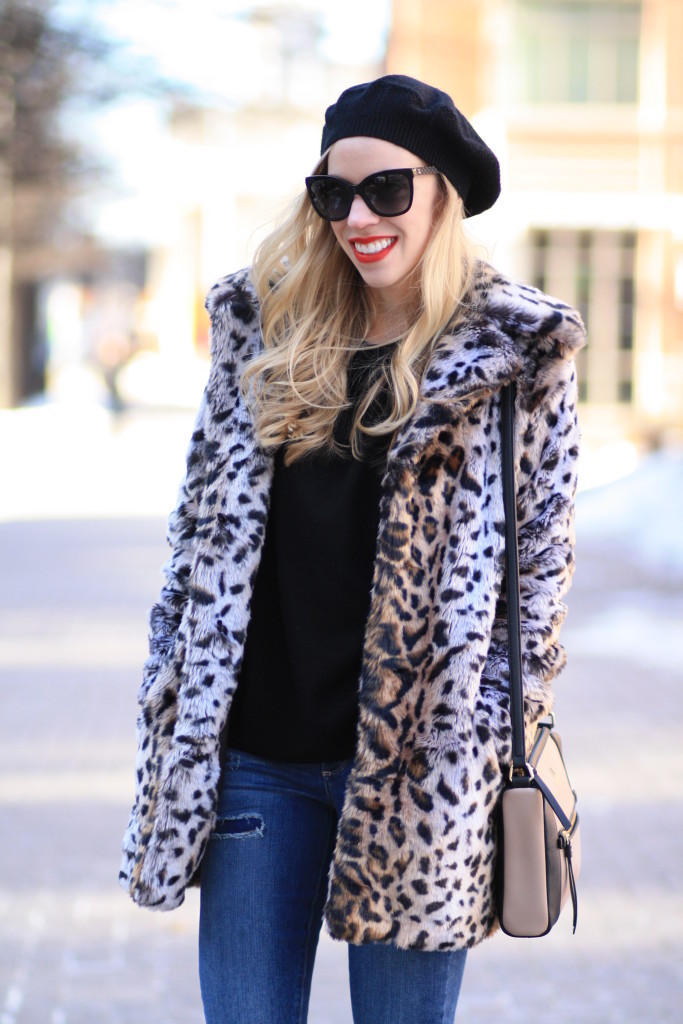 black cashmere beret hat, Piperlime leopard faux fur coat, black oversized sweater, Paige 'Carmen tear and repair' verdugo skinny jeans, Kate Spade colorblock bag, Clinique 'red red red' lipstick, Chanel cateye sunglasses