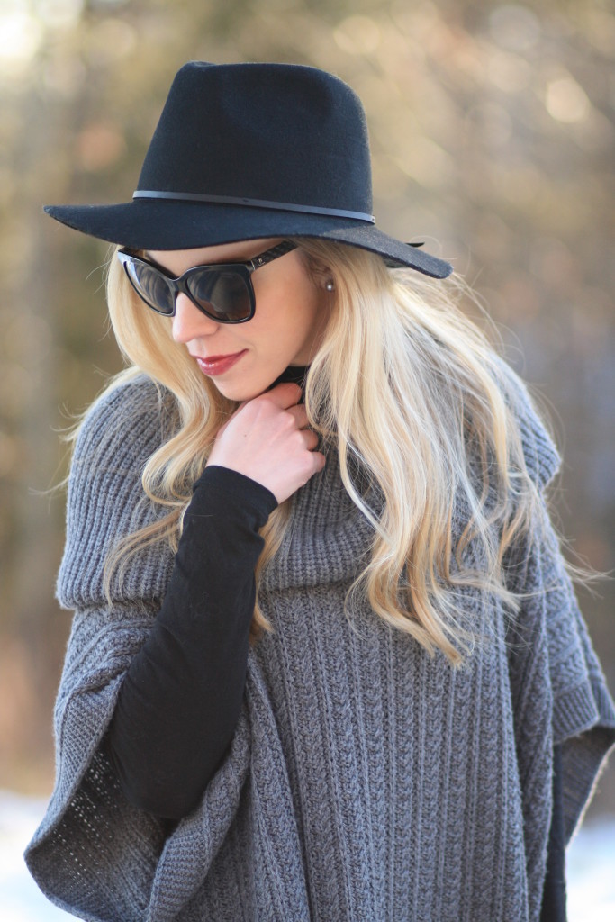 Brixton 'Wesley' black wool fedora, Chanel cateye sunglasses, Ralph Lauren gray cable cowlneck poncho, gray and black winter outfit