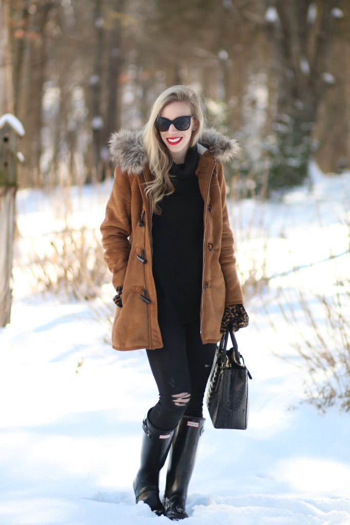 camel toggle coat with fur hood, ann taylor cashmere tunic, AG Adriano Goldschmied black distressed middi ankle jean, black Hunter tall glossy boots, camel and black winter outfit, red lip, Brahmin small lincoln satchel