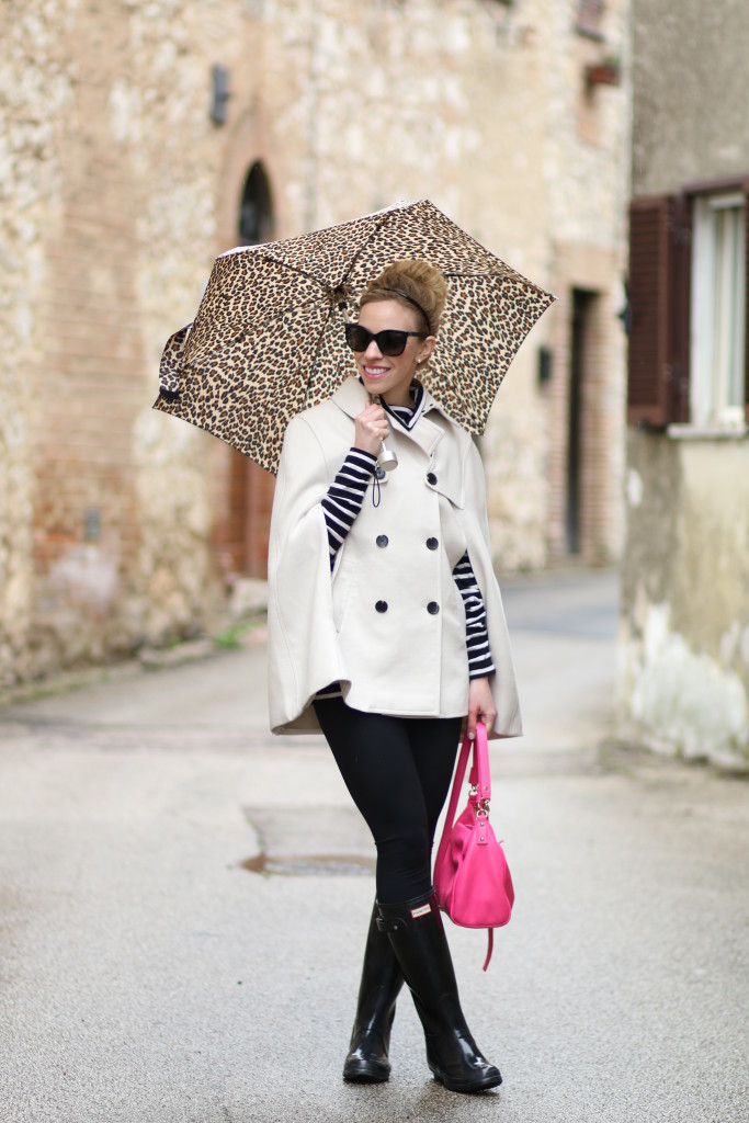 Ann Taylor khaki trench cape, black and white striped J. Crew turtleneck, Zella black live-in leggings, black Hunter tall glossy rain boots, Kate Spade hot pink bag, trench cape rainy day outfit, leopard print, Italian fashion blog