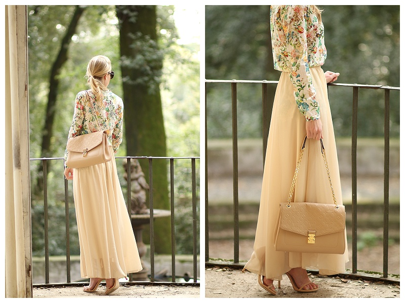 https://www.meagansmoda.com/wp-content/uploads/2015/04/Chic-Wish-nude-pleated-maxi-skirt-Stuart-Weitzman-Nudist-stiletto-sandals-Louis-Vuitton-st.-germain-monogram-bag-in-dune-long-sleeve-blouse-with-maxi-skirt-outfit-how-to-wear-stilettos-with-maxi-skirt-Zara-floral-print-shirt.jpg