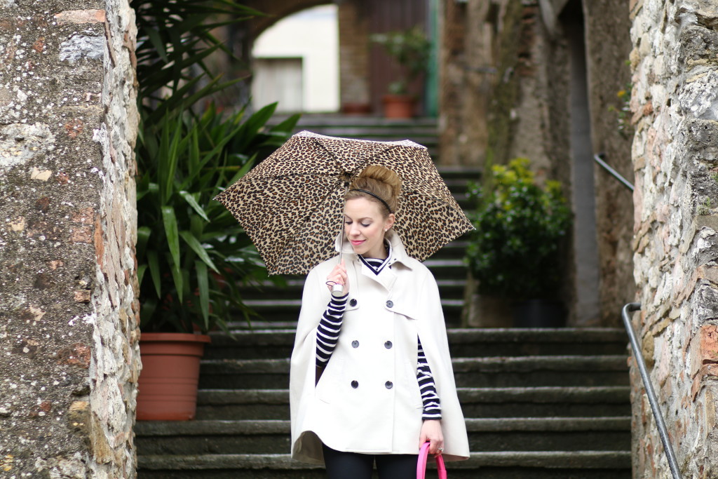 leopard print umbrella, Ann Taylor khaki trench cape, J. Crew loose fit black and white striped turtleneck, rainy day outfit trench cape and Hunter boots, Italian fashion blogger, hot pink Kate Spade bag