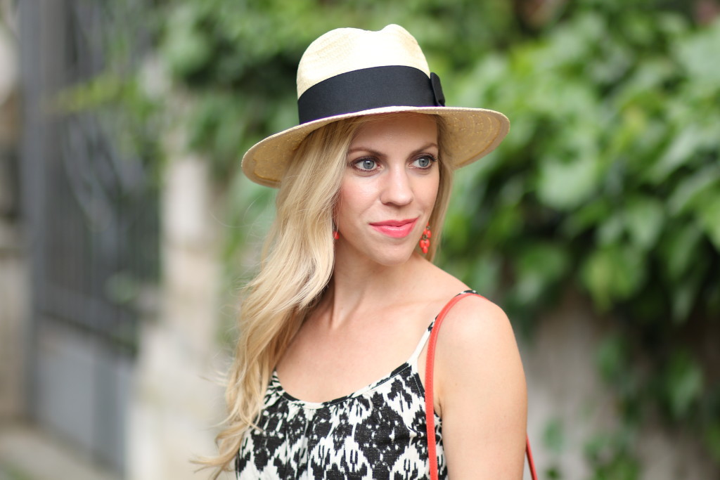 H&M straw hat with black bow sash, Estee Lauder surreal sun lipstick, ikat print camisole