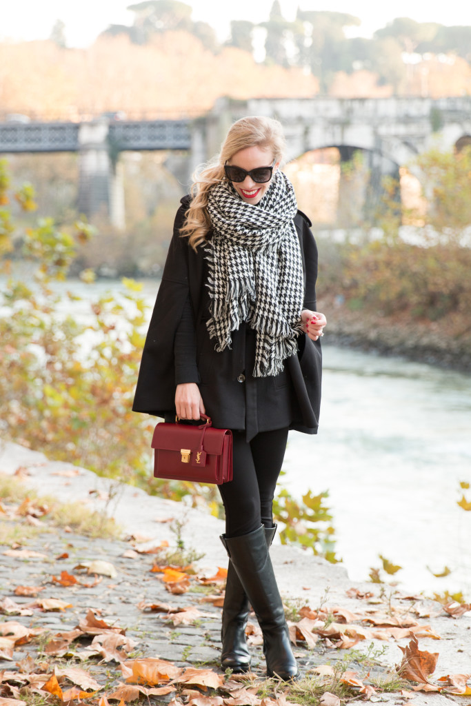 Feeling Festive: Houndstooth scarf, Black cape & Red handbag