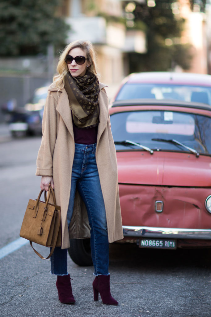 Meagan Brandon fashion blogger of Meagan's Moda wears camel coat with Louis Vuitton brown shine shawl and burgundy boots