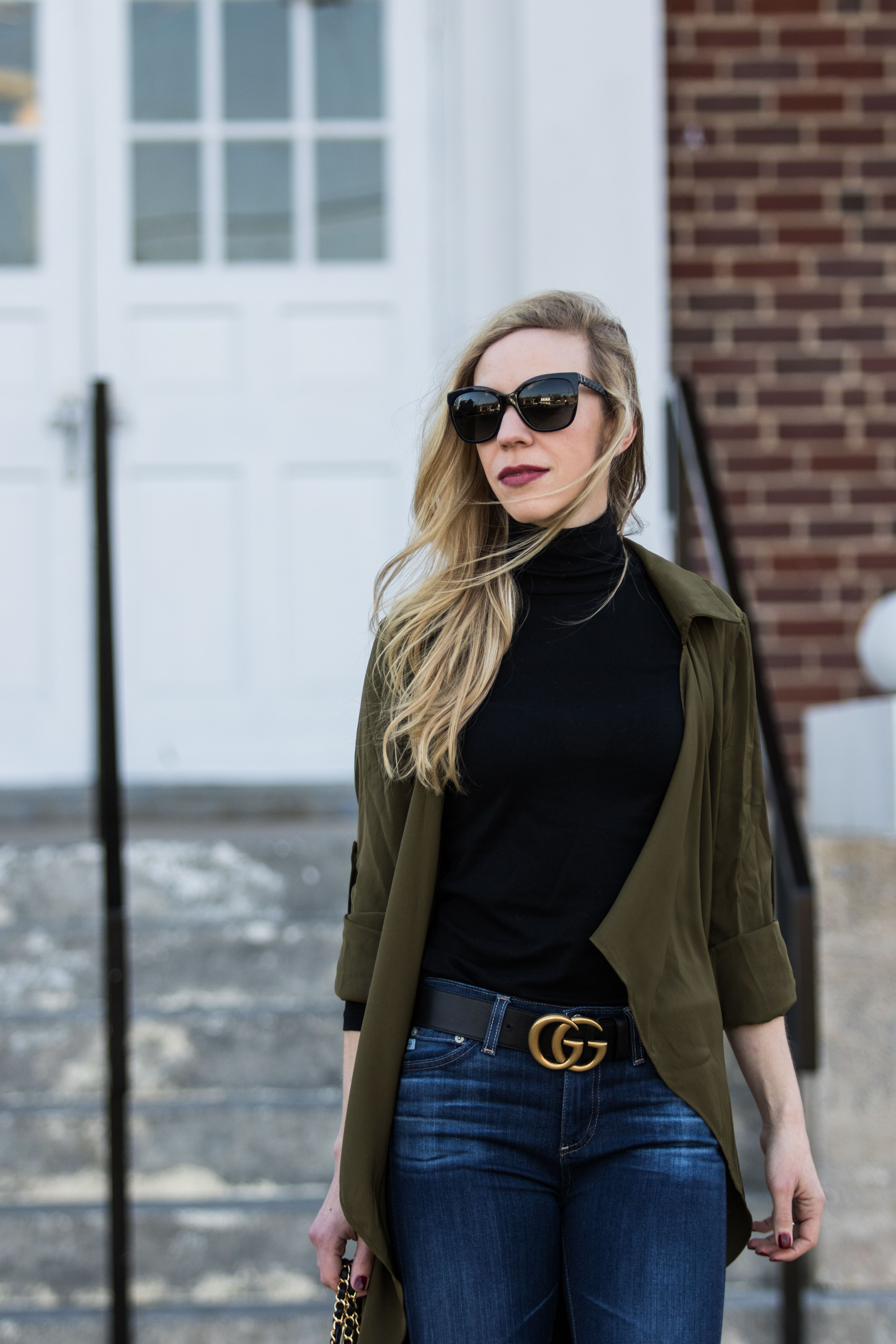 Meagan Brandon fashion blogger wearing olive utility duster jacket with  Gucci Marmont belt and Valentino Rockstud pumps, black and gold buckle  Gucci belt outfit - Meagan's Moda