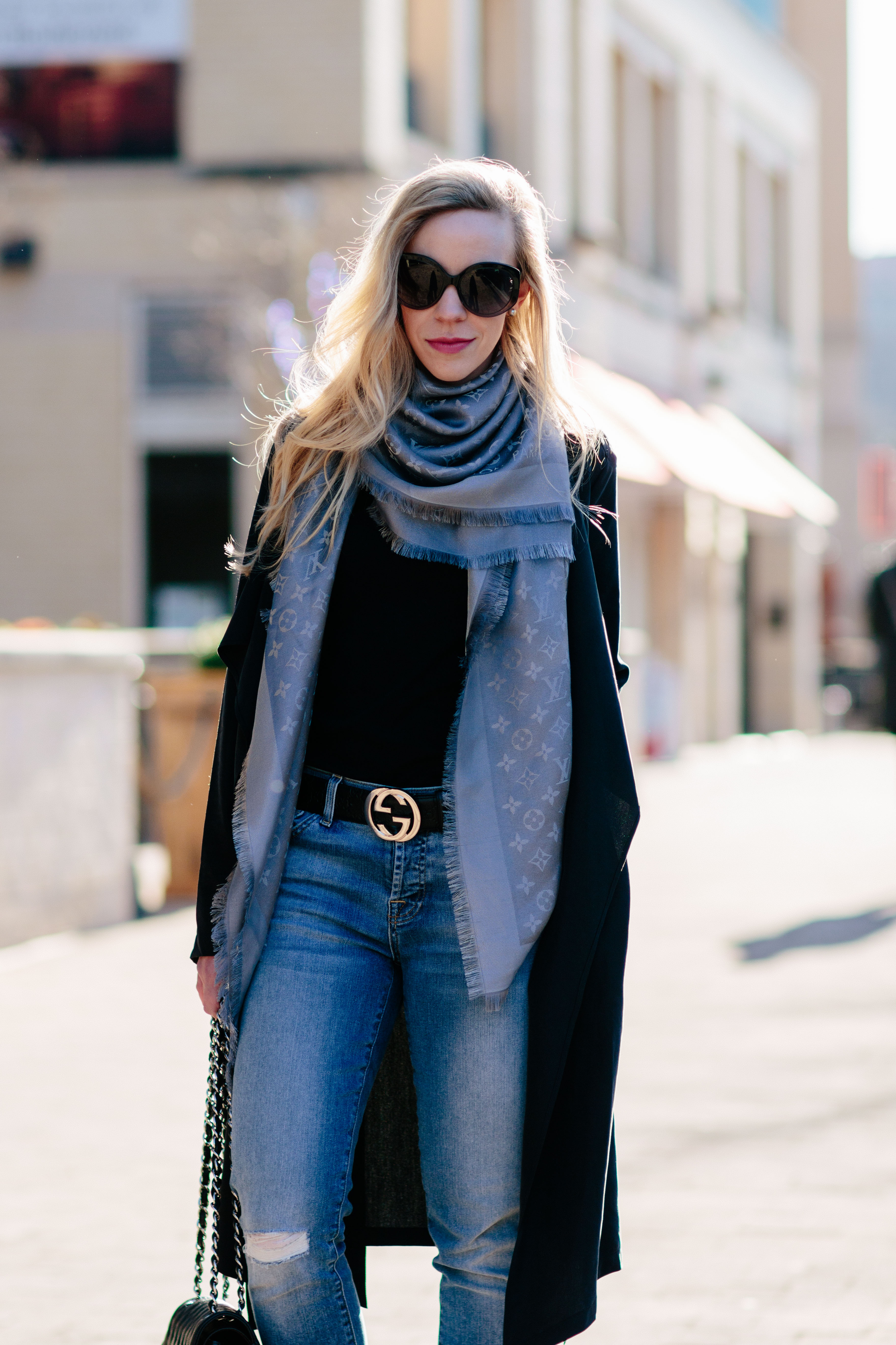 Meagan Brandon fashion blogger of Meagan's Moda wears Louis Vuitton brown  shine shawl monogram scarf with H&M belted plaid blazer and Saint Laurent  suede sac de jour - Meagan's Moda