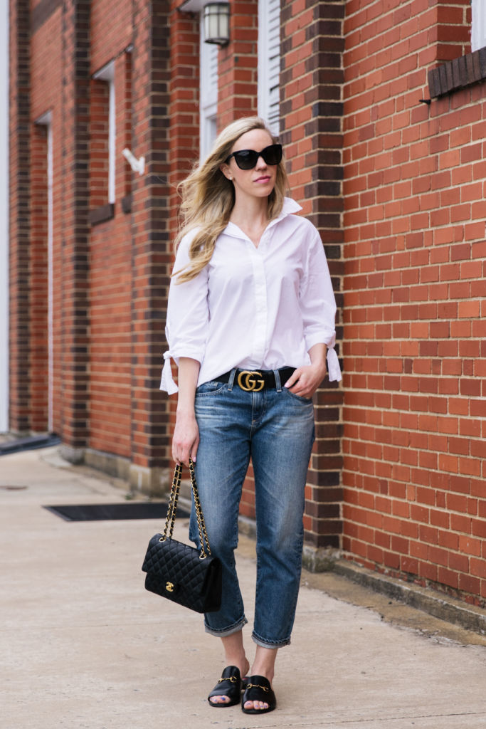 Casual outfit. White tee with blue jeans and a brown Gucci belt. I