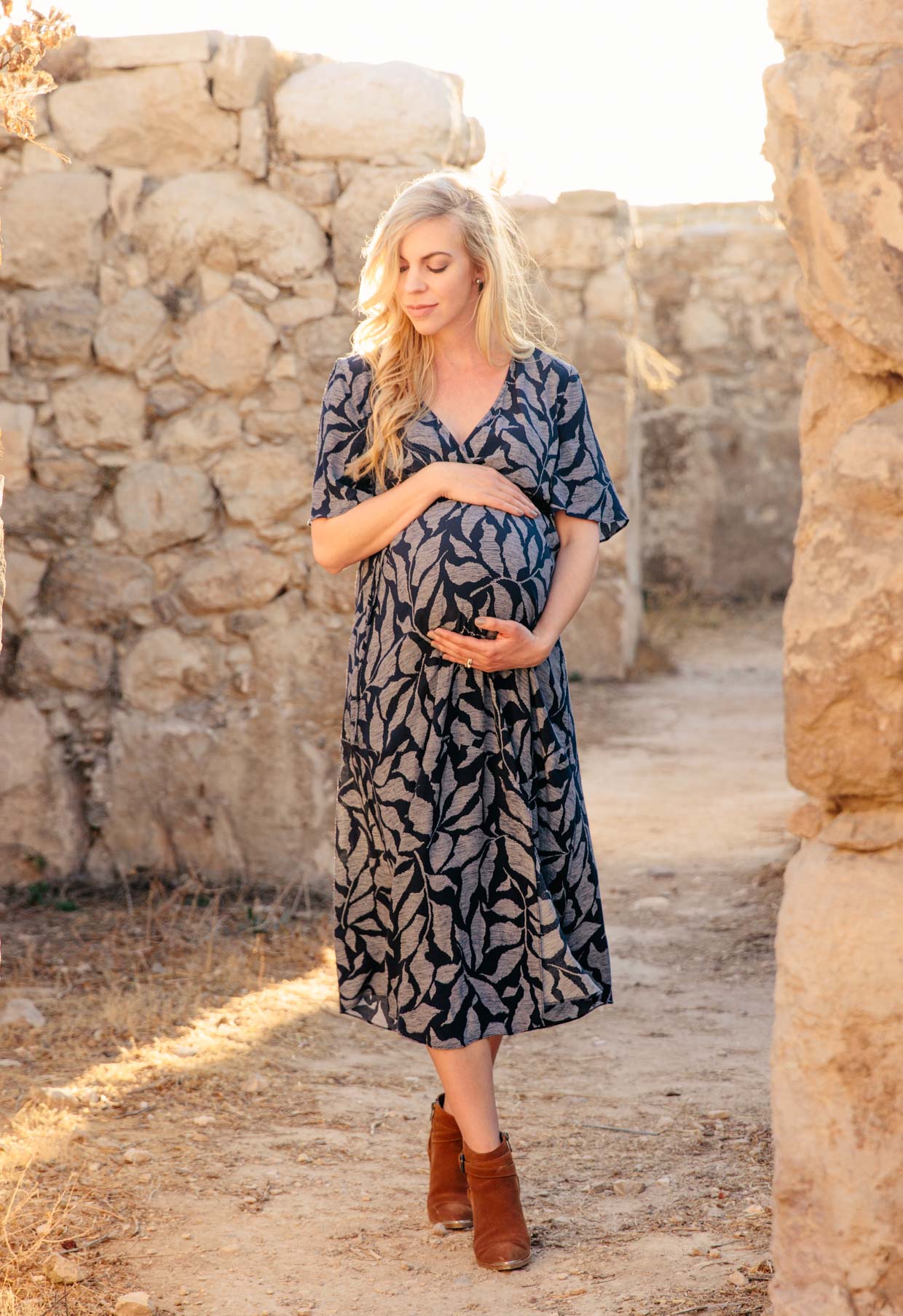 Meagan Brandon of Meagan's Moda wears BLANQI crossback maternity