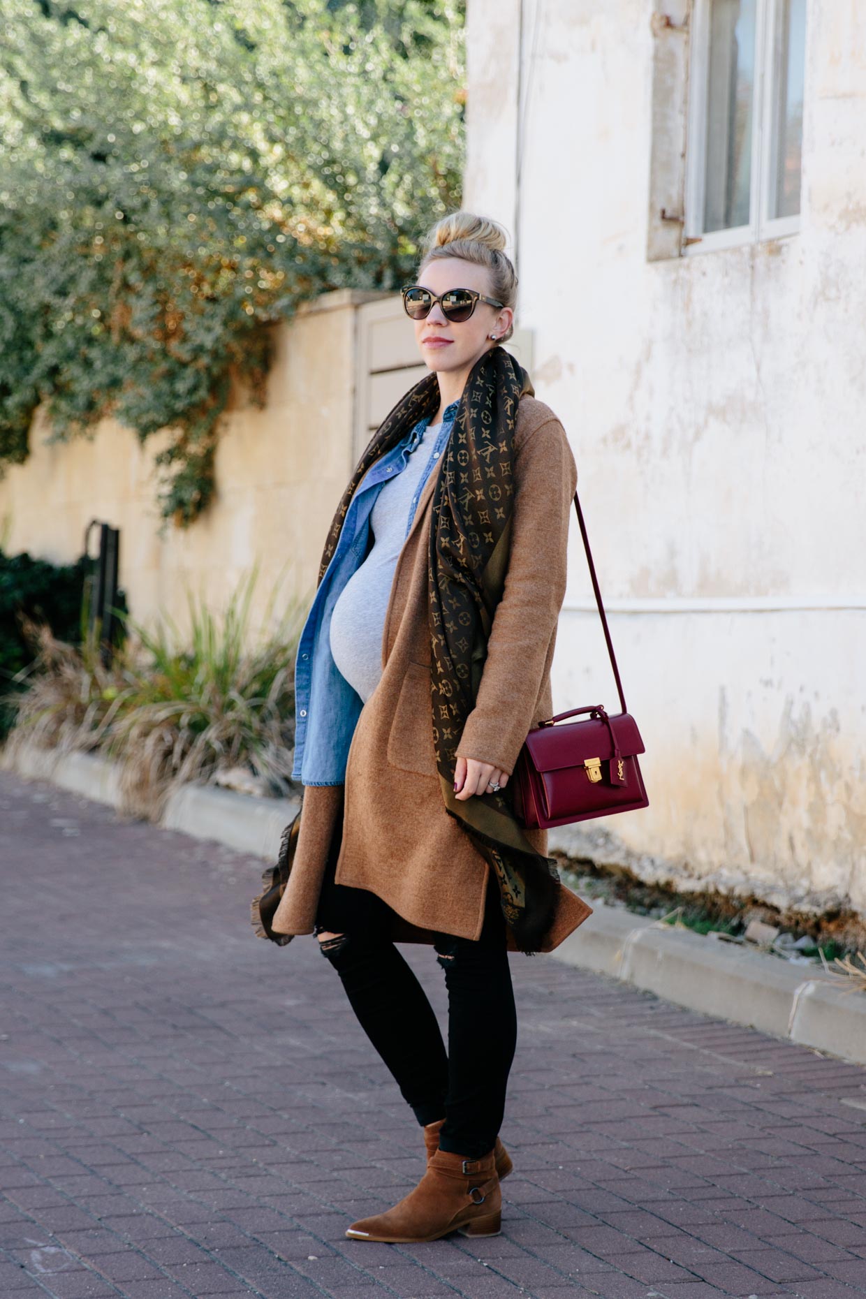 Chic layered fall look for maternity style with camel sweater coat, denim  shirt, Louis Vuitton monogram scarf and black jeans - Meagan's Moda