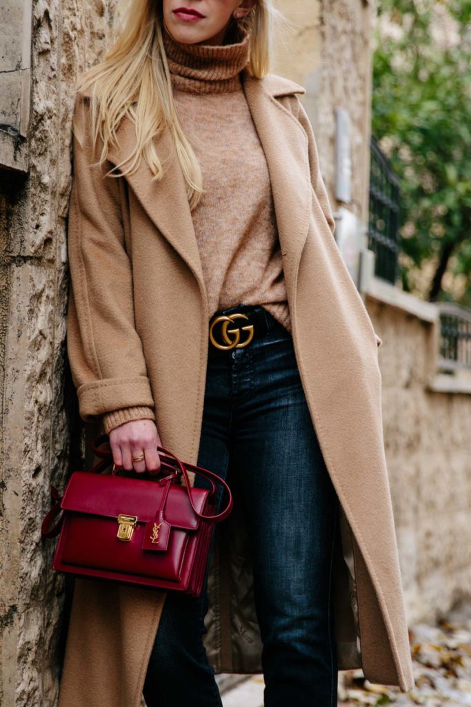 Meagan Brandon fashion blogger of Meagan's Moda wears Max Mara camel coat with Gucci belt and black jeans