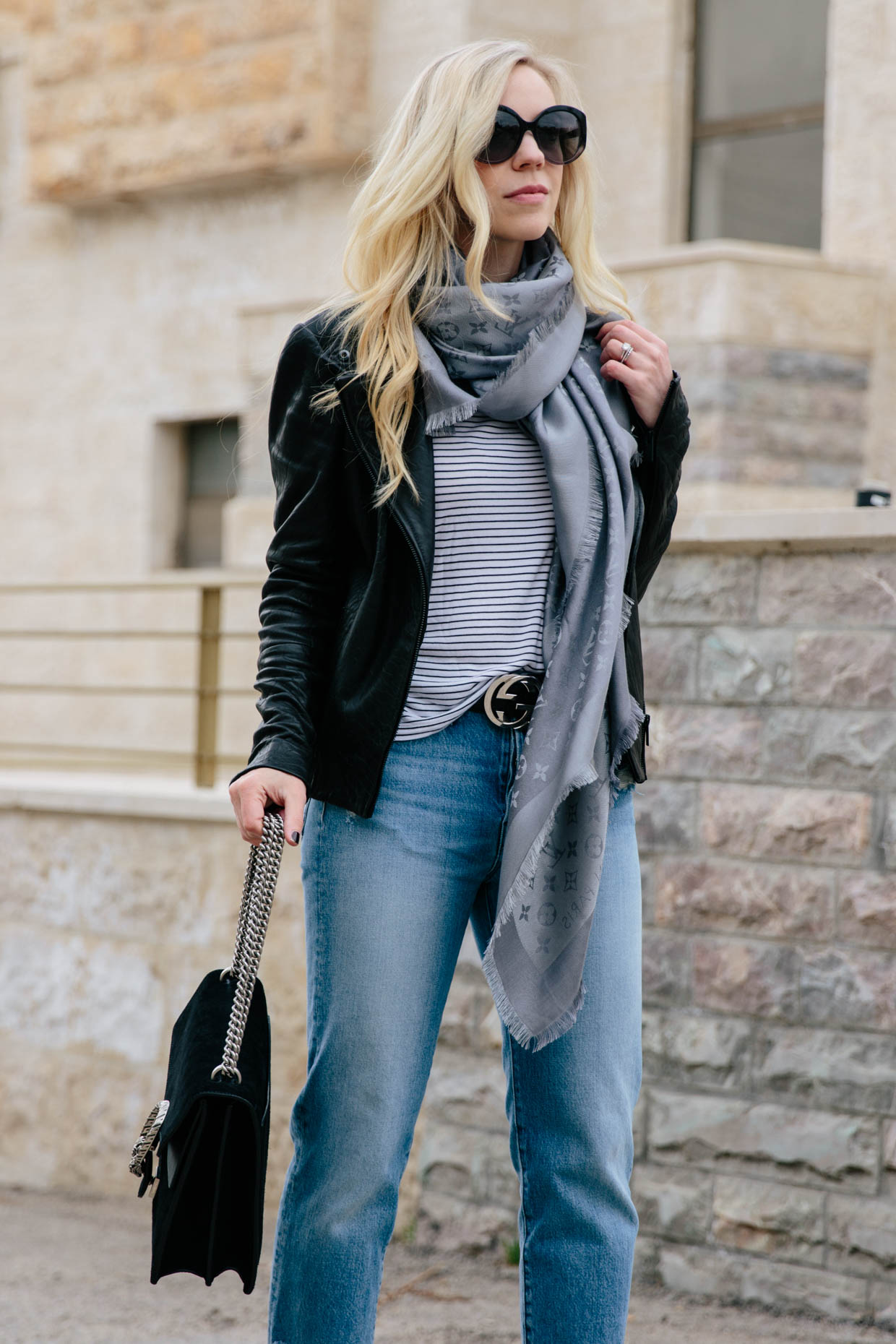 How to style a Louis Vuitton scarf with a leather jacket and gray denim, Louis  Vuitton black shine shawl outfit idea - Meagan's Moda