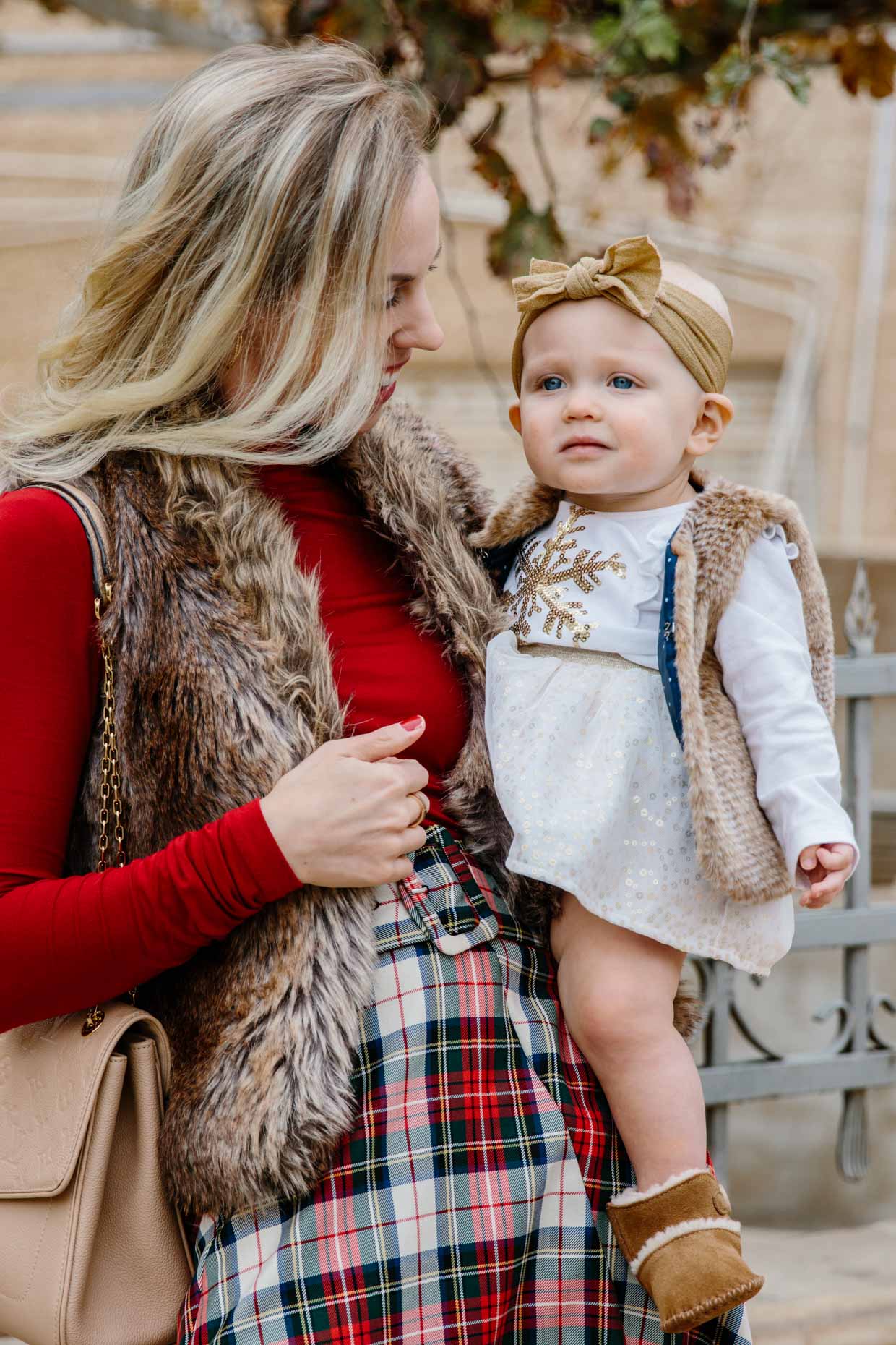 Mommy Me Christmas Outfit Idea with Faux Fur Vests Meagan s Moda