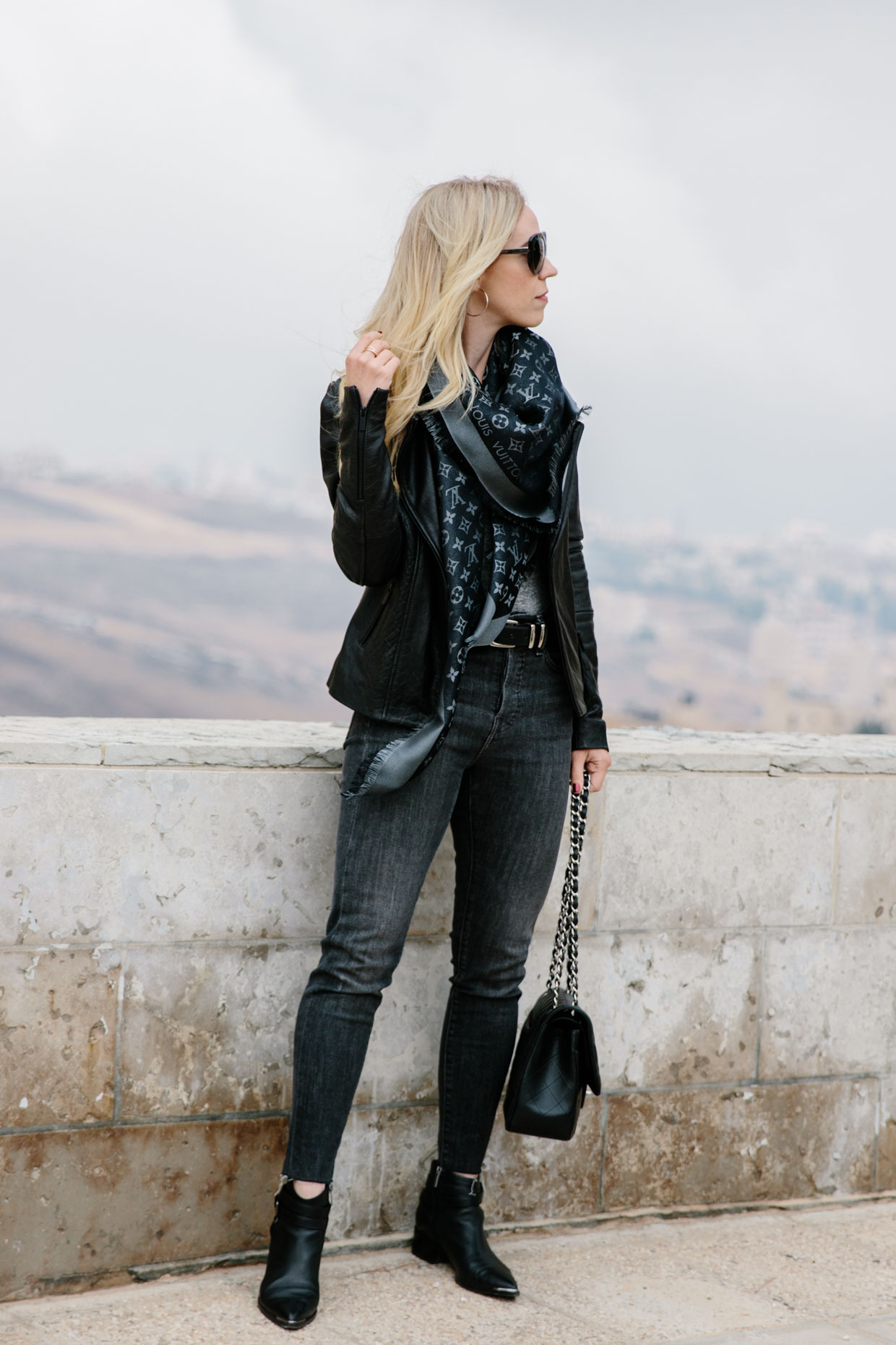 How to style a Louis Vuitton scarf with a leather jacket and gray