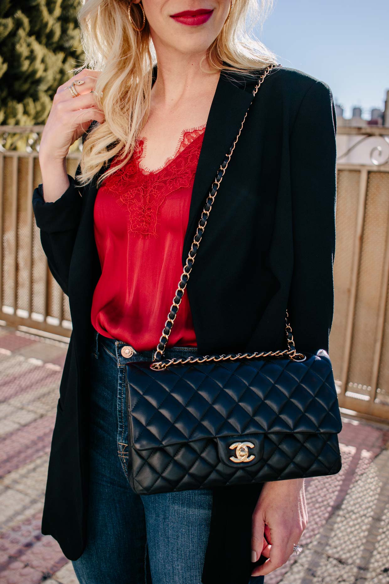 Chic fall outfit idea with long black blazer, lace camisole, black