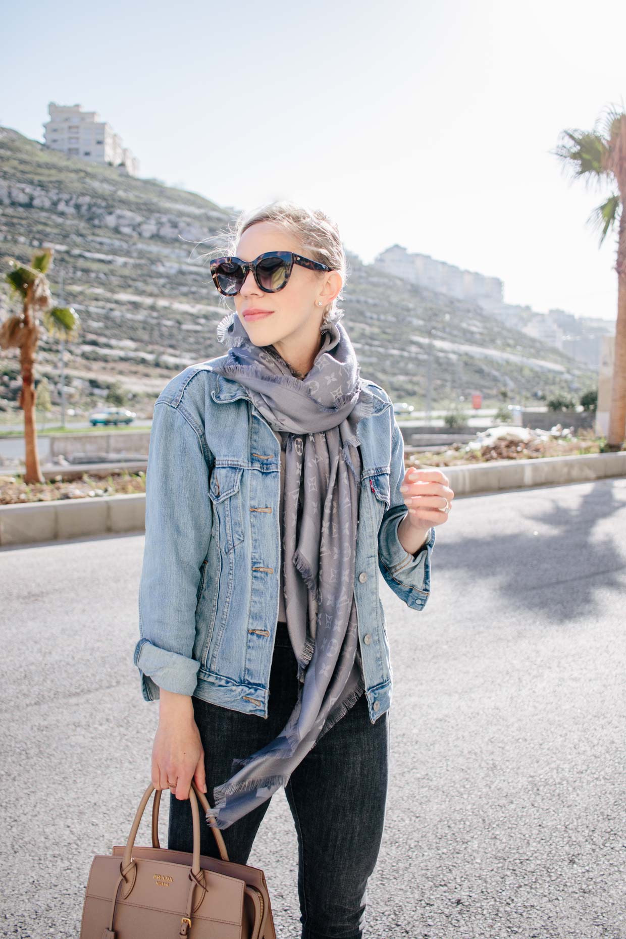 Meagan Brandon fashion blogger of Meagan's Moda styles Louis Vuitton  charcoal shine shawl scarf with Levi's denim jacket for casual spring outfit  - Meagan's Moda