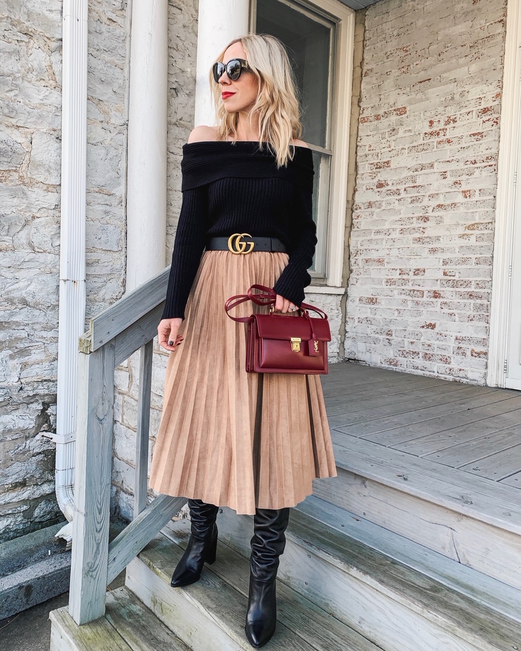 Meagan-Brandon-fashion-blogger-of-Meagans-Moda-shares-romantic-outfit-idea-for-Valentines-Day-with-off-shoulder-sweater-and-pleated-midi-skirt.jpg