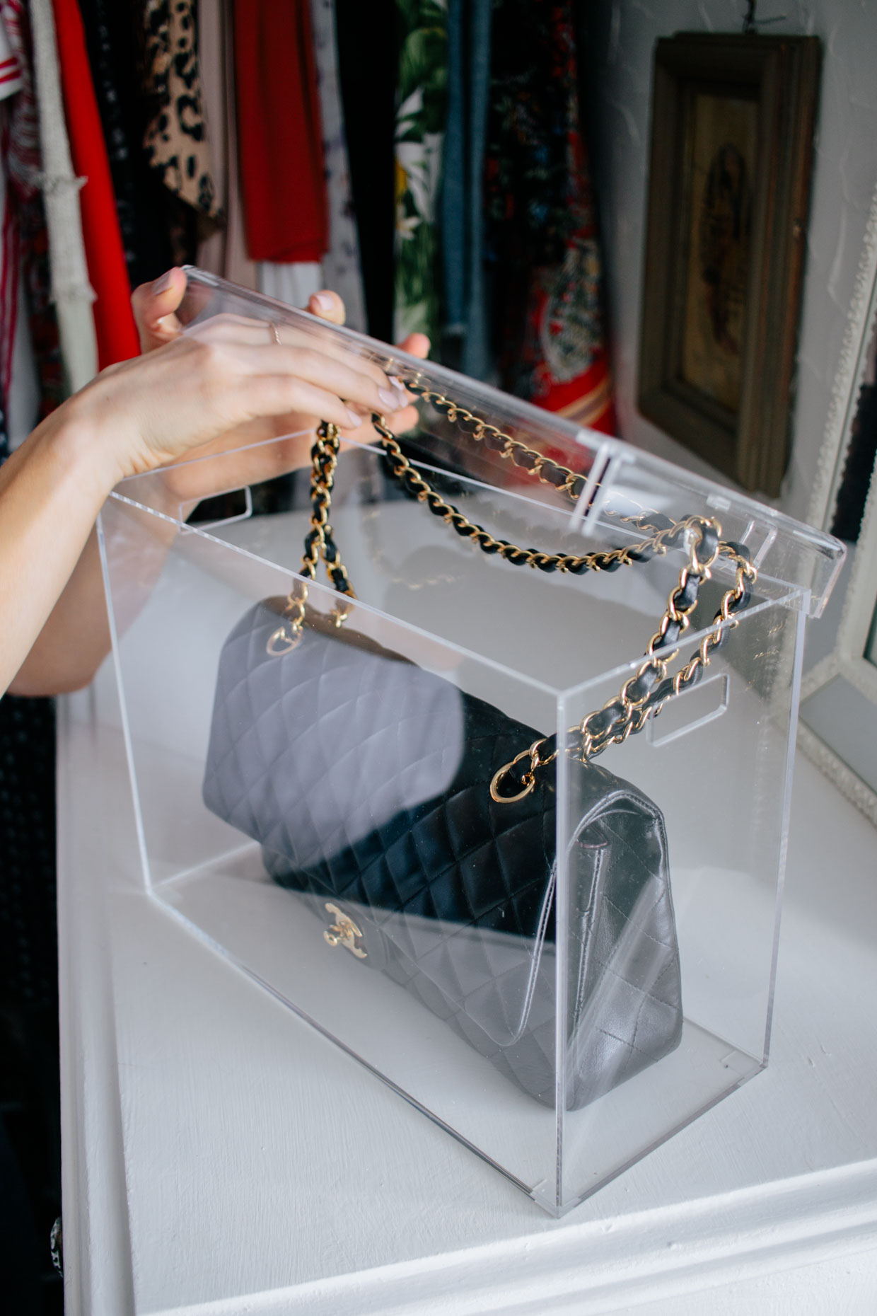 Meagan Brandon fashion blogger of Meagan's Moda shows how to properly store and display Chanel handbags with Luxury Bag Display acrylic case