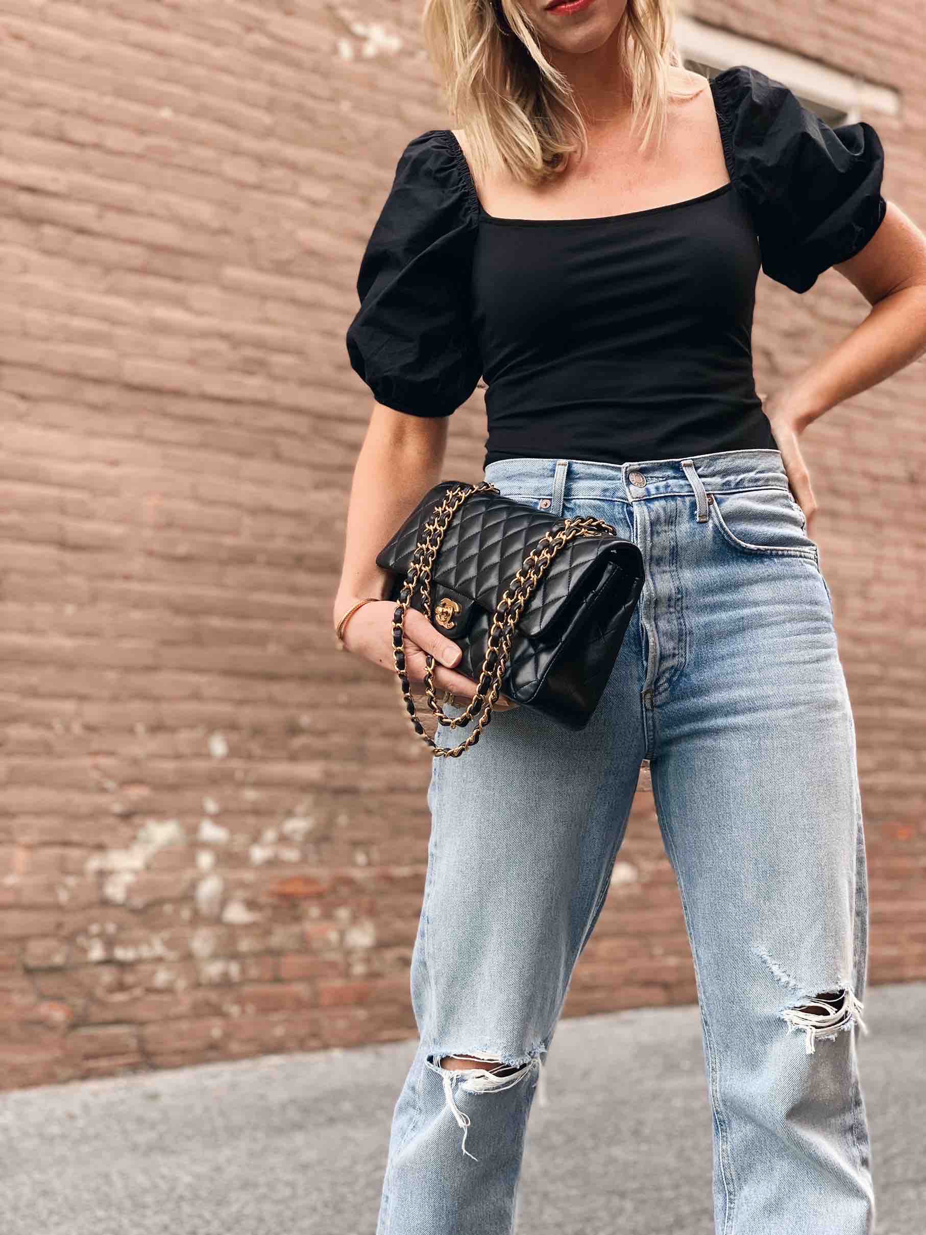 A puff-sleeve top looks perfect juxtaposed with cargo jeans
