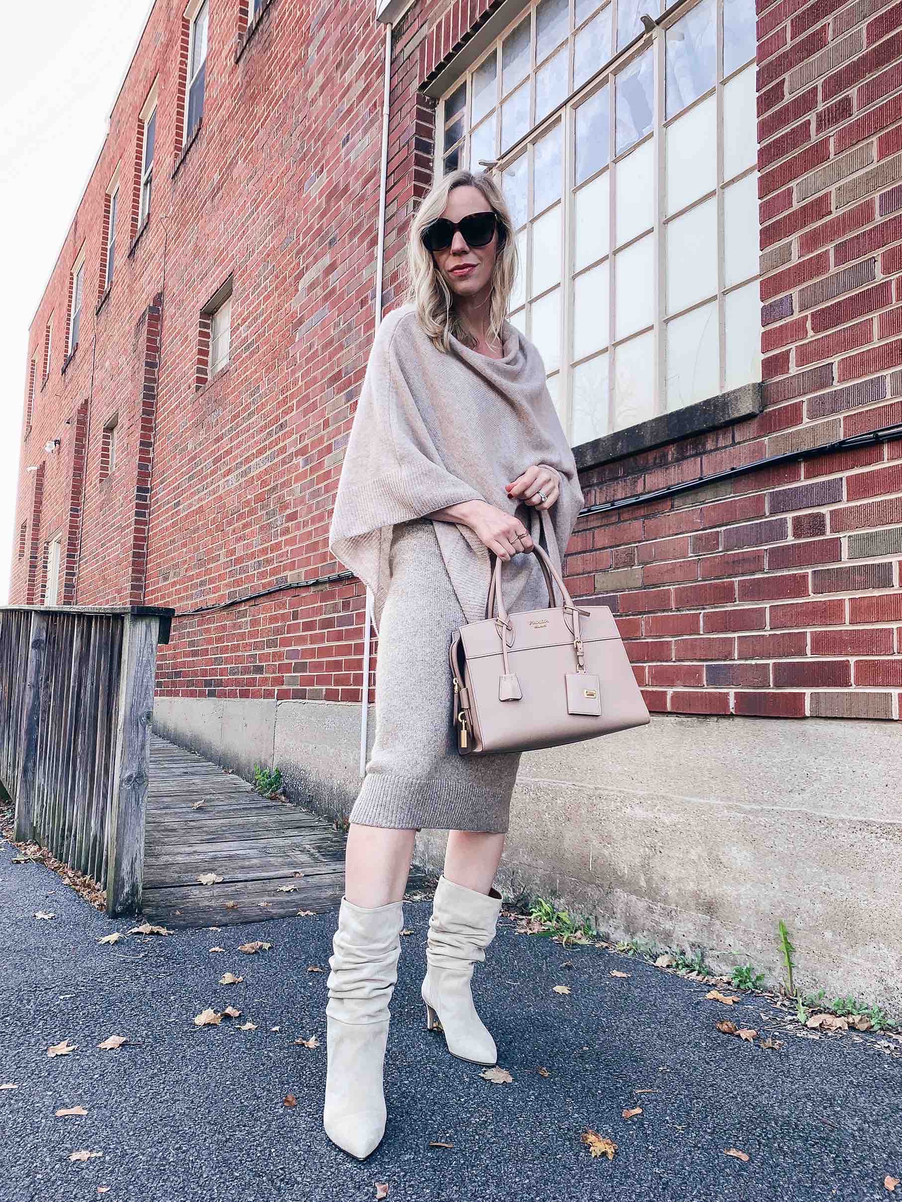 Meagan Brandon fashion blogger of Meagan's Moda wears camel poncho with  faux leather mini skirt, croc leather knee high boots and Louis Vuitton Dauphine  MM - Meagan's Moda