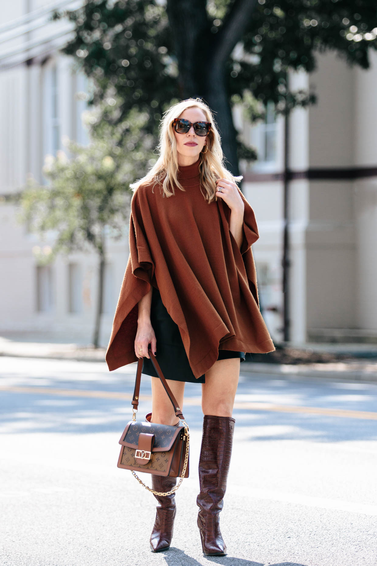 Meagan Brandon fashion blogger of Meagan's Moda wears camel poncho with Louis  Vuitton Dauphine MM - Meagan's Moda