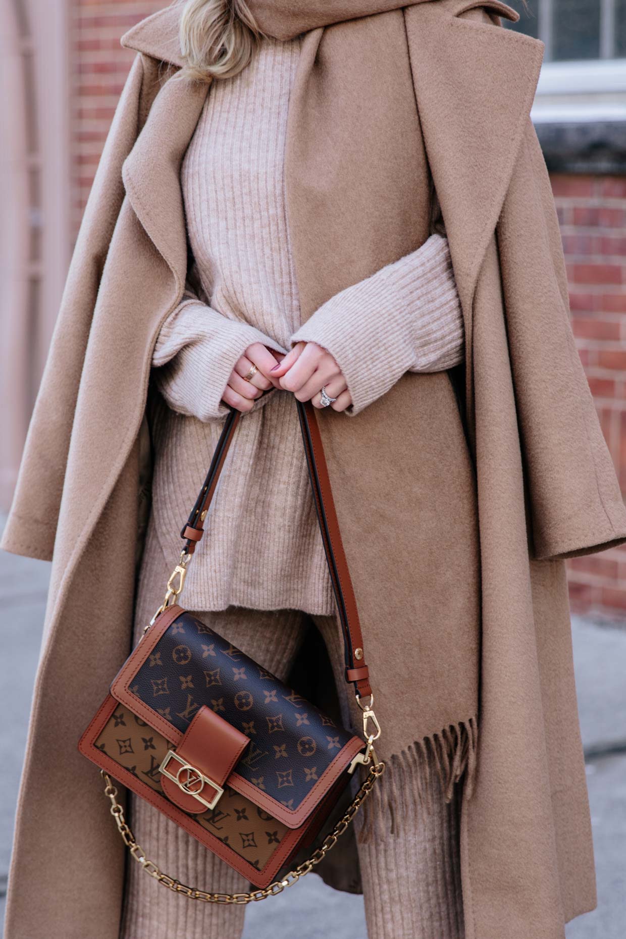 Meagan Brandon fashion blogger of Meagan's Moda wears Louis Vuitton brown  monogram shine shawl with camel sweater and black denim skirt - Meagan's  Moda