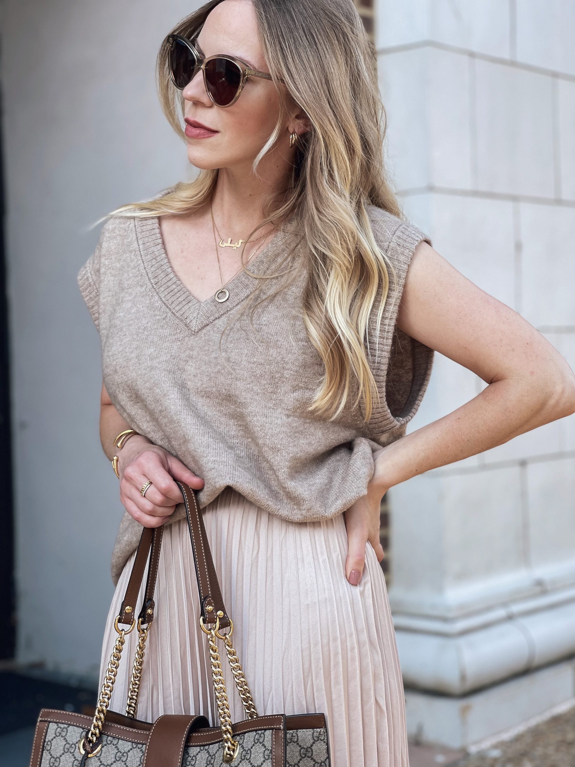 Meagan Brandon fashion blogger of Meagan's Moda wears Chicwish camel  cropped sweater with burgundy pleated midi skirt and Louis Vuitton Dauphine  MM bag - Meagan's Moda