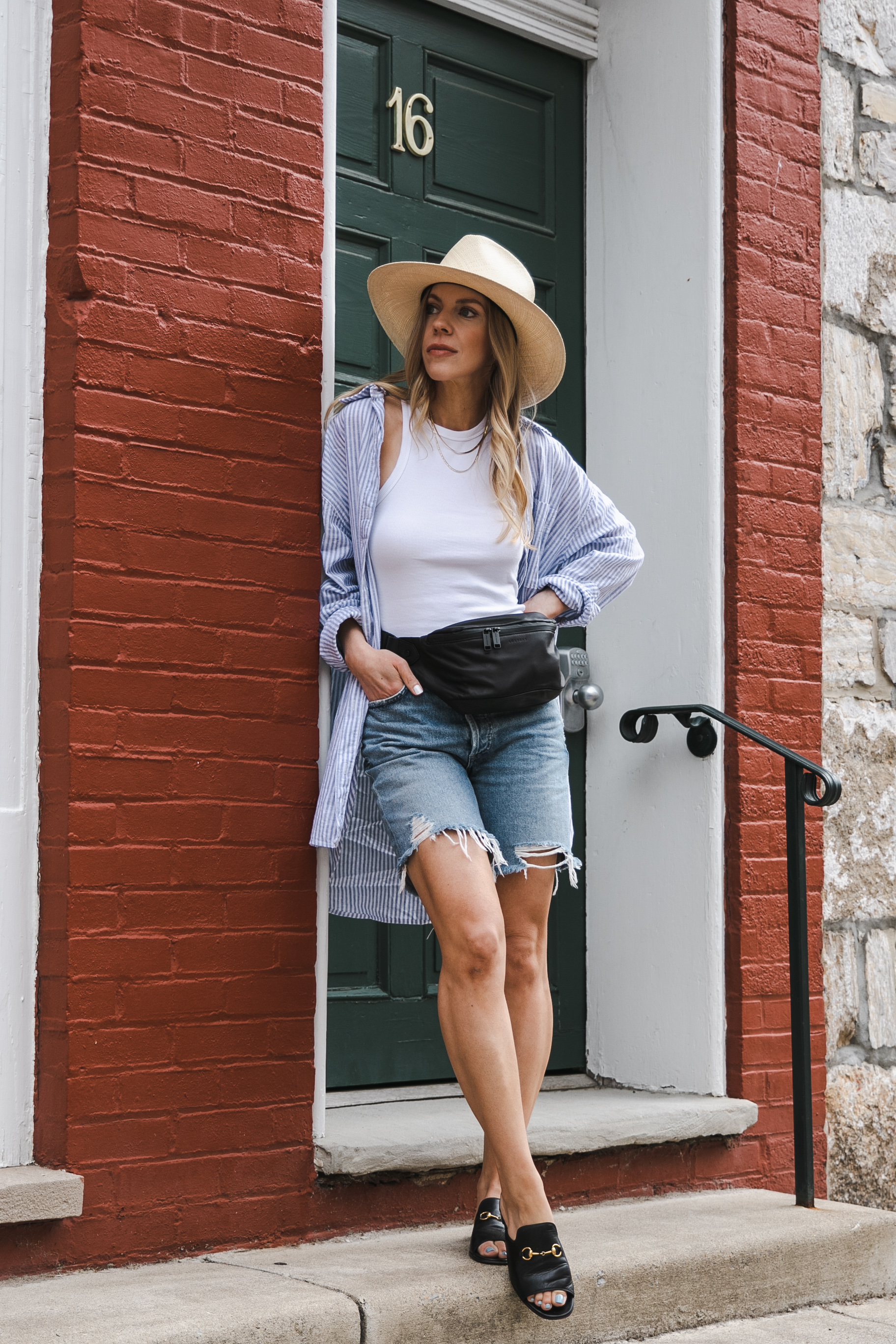 Meagan Brandon fashion blogger of Meagan's Moda wears blue and white  striped shirt with olive paperbag waist shorts and Gucci bag - Meagan's Moda